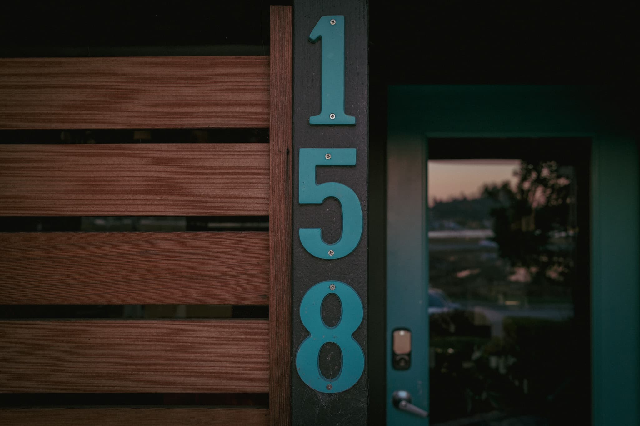 The handmade 158 address beside Almonte Spa's blue door